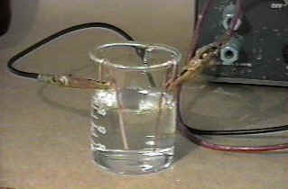 Electrolysis of silver nitrate solution with copper electrodes - before.